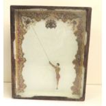 A 19th Century sand toy of a trapeze artist "Leotard" by Brown, Blondin & Co, with label on the
