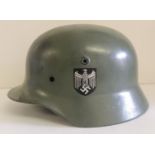 A German metal helmet with side markings, lacks lining