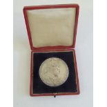 EDWARD VII - a large Coronation medal in original red leather case with gilt lettering