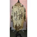 A ladies bi-colour coney fur coat with red silk lining