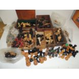 A large quantity of turned boxwood and ebony part chess sets, many Staunton pattern, some with