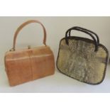 A light brown lizard skin handbag by Mappin and Webb, London with small gilt metal clasp, unused,