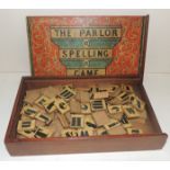 A Victorian boxed game - The Parlor Spelling Game, in original mahogany box, the sliding cover