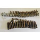 A belt of used German MG34 or MG42 machine gun bullets together with a used belt of 7.92 Besa tank