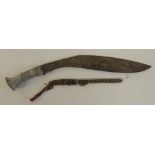 A Kukri with carved white metal handle, overall 52.5cms long together with a length of beadwork