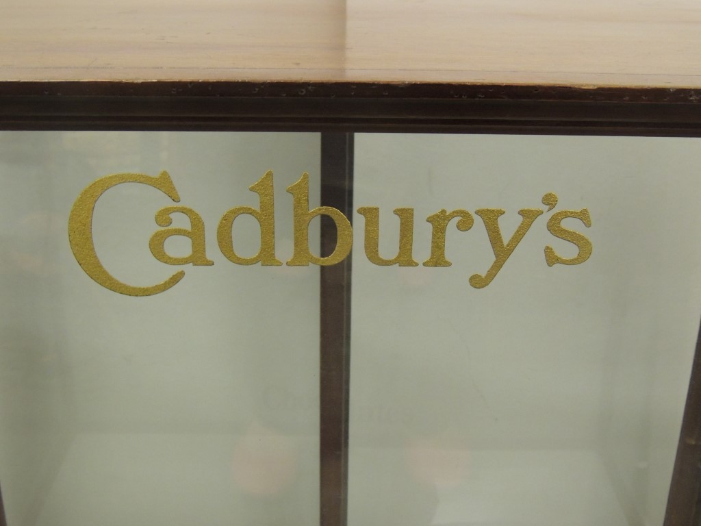 CADBURYS CHOCOLATES - a mahogany display cabinet, polished mahogany and with sliding glass rear - Image 2 of 3