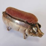 EDWARDIAN NOVELTY SILVER PIN CUSHION IN THE FORM OF A STANDING PIG, BY SPURRIER AND CO LIMITED,