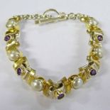 925 SILVER BRACELET BY PAULA BOLTON, EACH PANEL SET WITH EITHER AN AMETHYST OR BUTTON PEARL