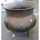 LATE 19TH EARLY 20TH CENTURY BRASS LOG BUCKET WITH FRUIT EMBOSSED DECORATION ON 3 SUPPORTS