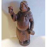 CARVED WOODEN FIGURE OF MONK 51CMS