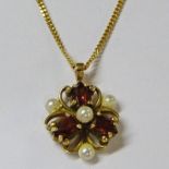 9CT GOLD, GARNET & CULTURED PEARL PENDANT ON 9CT GOLD FINE CHAIN