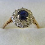SAPPHIRE & DIAMOND CLUSTER RING IN SETTING MARKED 18CT & PLATINUM