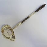 19TH CENTURY TODDY LADLE WITH MAKERS MARK R M C, POSSIBLY SCOTTISH WITH TURNED HANDLE