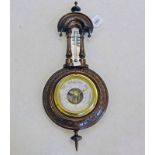 WALNUT BAROMETER WITH CARVED DECORATION