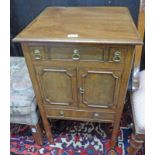 19TH CENTURY MAHOGANY BEDSIDE CABINET WITH 2 SMALL & 1 FALSE DRAWER OVER 2 PANEL DOORS OVER DRAWER