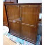 LATE 19TH CENTURY MAHOGANY HALL CUPBOARD WITH 2 PANEL DOORS, FITTED INTERIOR & BRACKET SUPPORTS