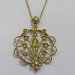 SEED PEARL & PERIDOT PENDANT MARKED 9CT ON FINE CHAIN