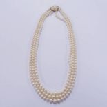 GRADUATED 3-STRAND CULTURED PEARL NECKLACE WITH 9CT GOLD CLASP IN CASE BY CAIRNCROSS OF PERTH