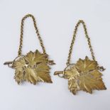 PAIR OF SILVER GILT VINE LEAF WINE LABELS WITH NAMES PORT AND MADEIRA MARKED LONDON 1823-24