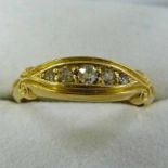 19TH CENTURY 18 CARAT GOLD BOAT SHAPED RING SET WITH 5 OLD-CUT DIAMONDS