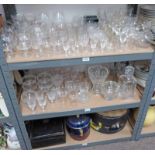 SELECTION OF CRYSTAL/GLASS, ETC. ON THREE SHELVES INCLUDING DECANTER, VASES, JUGS, AND OTHERS