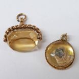 9 CARAT GOLD MOUNTED SWIVEL FOB AND DOGS HEAD INTAGLIO PENDANT