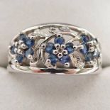 SAPPHIRE AND DIAMOND FLOWER SET CLUSTER RING MARKED 10K