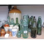 SELECTION OF GLASS BOTTLES MARKED IREDALE, CARLISLE TOGETHER WITH STONEWARE JAR STAMPED HICKS AND