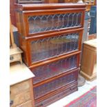 EARLY 20TH CENTURY GLOBE-WERNICKE STYLE MAHOGANY 4 TIER BOOKCASE WITH LEADED GLASS PANELS AND