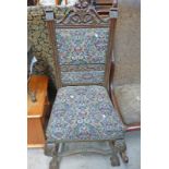 LATE 19TH CENTURY OAK HALL CHAIR WITH PADDED SEAT AND BACK, CARVED DECORATION AND SHAPED SUPPORTS