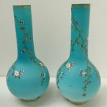 PAIR OF LIGHT BLUE OPAQUE GLASS BALUSTER VASES DECORATED WITH FLOWERS  30CM HIGH