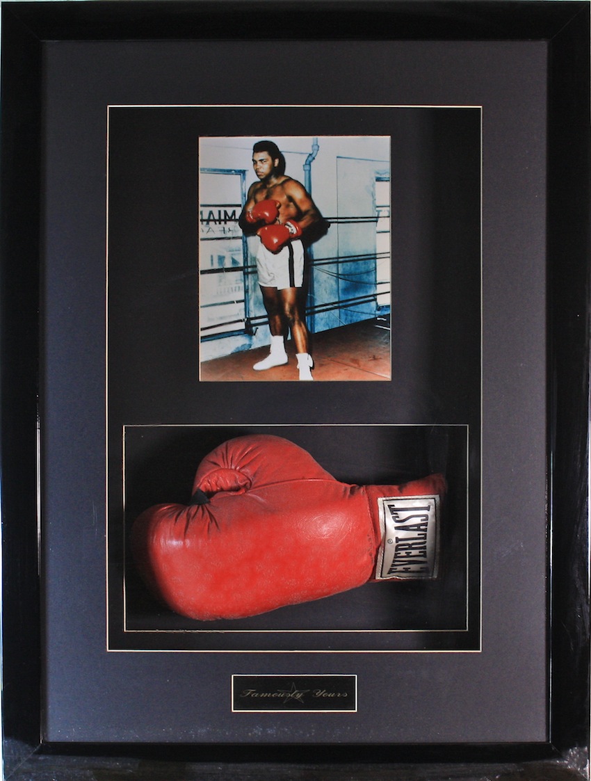 Muhammad Ali Cassius Clay signed Glove. A signed Everlast boxing glove display. Originally signed