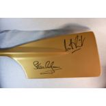 Steve Redgrave, Mathew Pinsent Signed Rowing Oar.  A gold painted rowing oar signed by Olympic