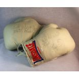 Frank Bruno collection of signed memorabilia. Consisting of two signed Lonsdale boxing gloves. A