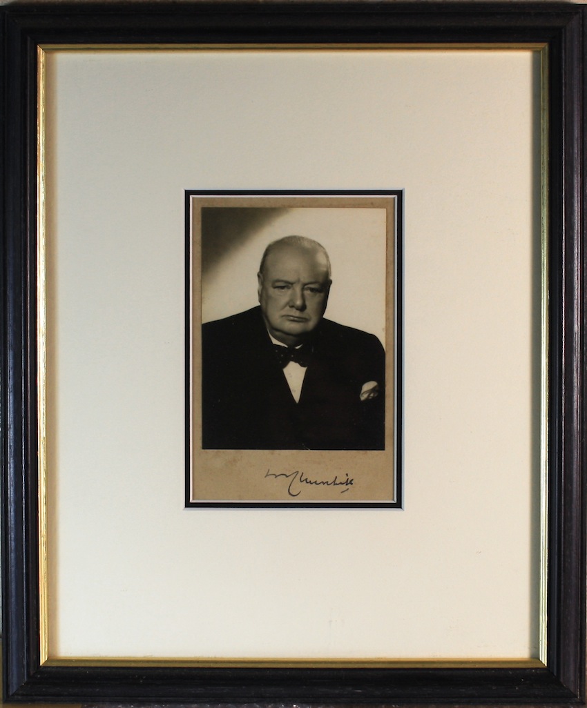 Winston Churchill Signed Photograph. A Black and white 5x4” photograph signed in blue ink by Winston