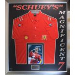 Michael Schumacher signed display and worn top. Celebrating the Formula 1 drivers 7 world driver