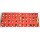 Forty Four Fox Hunt Buttons, mainly brass, all different, mounted and displayed on a piece of card