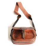 A Stitched Leather Cartridge Bag, inscribed 'Payne Galwey 75', with strap