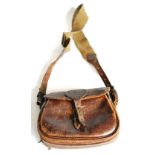 A Stitched Leather Cartridge Bag, with leather strap