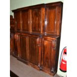 A Victorian rosewood breakfront side cabinet, fitted cupboard doors