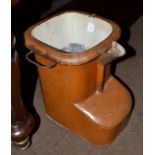A Victorian brown enamel container with pouring jug and handles