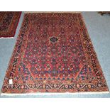 Borchalou rug, Persian Kurdistan, the brick red field of Herati design centred by a small