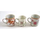 Three famille rose mugs