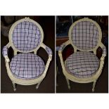 A pair of French 19th century open armchair with caned seats and later recovered