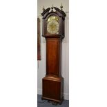 An oak eight day longcase clock, broken arch pediment, 13-inch arched brass dial bearing inscription