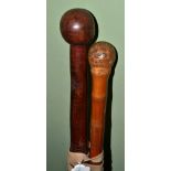 An African staff knobkerrie and a bamboo cane