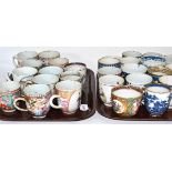 A collection of twenty eight 18th and 19th century Chinese export coffee cups (on two trays)