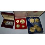 Four 18ct gold Sir Winston Churchill commemorative medals, five silver gilt coins in a Hampton and