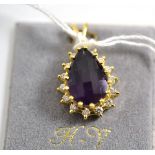 An 18ct gold amethyst and diamond pendant, a faceted amethyst within a border of brilliant cut
