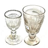A late 18th century facet cut sweet meat glass and a Regency coin goblet with etched decoration (a.